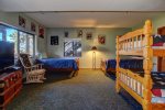Twins and Bunkbeds in Sleeping Area off Game Room